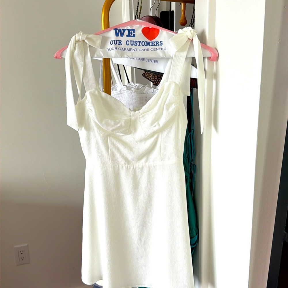 Lucy in the sky white dress. Perfect for spring break or graduation.